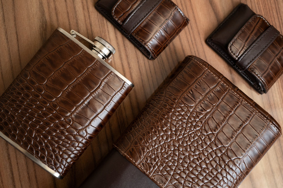 luxury brown leather flask with brown leather cigar case and other travel accessories available at cigarinc.com